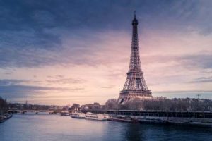 beautiful wide shot eiffel tower paris surrounded by water with ships colorful sky 1 1627639473 80.90.95.248